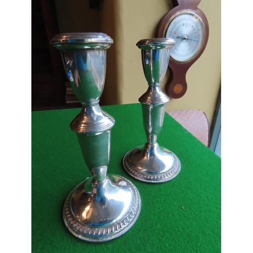 253 - Pair of Solid Silver Turned Form Pedestal Candle Sticks Each Approximately 7 Inches High