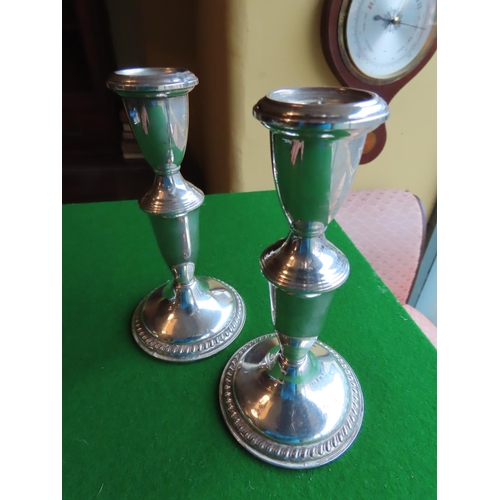 253 - Pair of Solid Silver Turned Form Pedestal Candle Sticks Each Approximately 7 Inches High