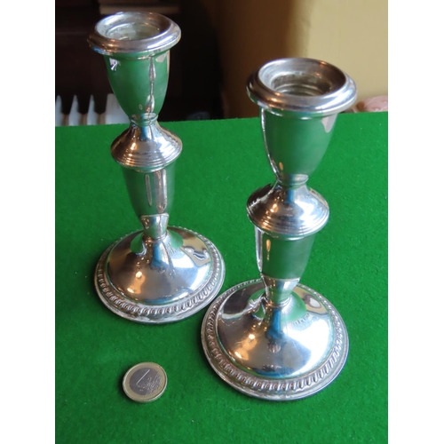 253 - Pair of Solid Silver Turned Form Pedestal Candle Sticks Each Approximately 7 Inches High