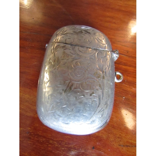 274 - Solid Silver Vesta Case with Engraved Decoration Oval Form Hinged Cover with Striker to Base