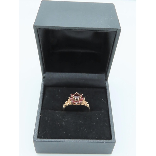 300 - 9 Carat Gold Garnet Cluster Ring Size N and a Half with Decorated Shoulders