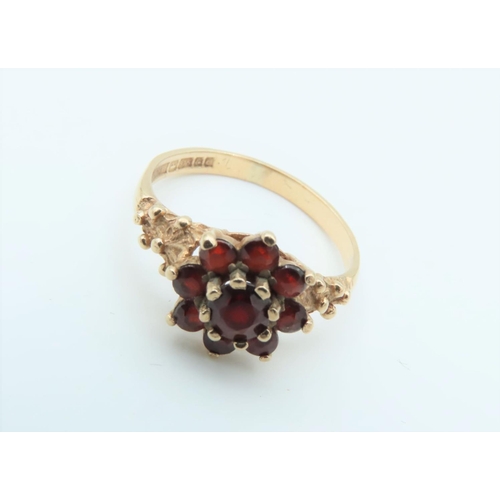 300 - 9 Carat Gold Garnet Cluster Ring Size N and a Half with Decorated Shoulders