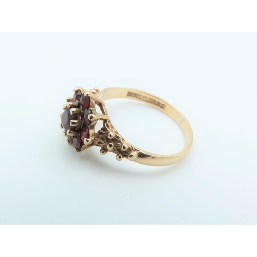 300 - 9 Carat Gold Garnet Cluster Ring Size N and a Half with Decorated Shoulders