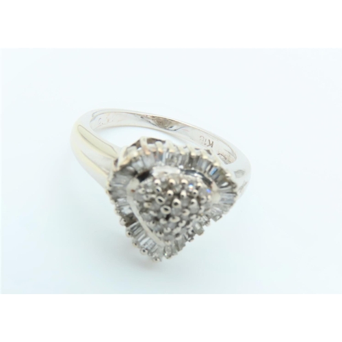 304 - Diamond Cluster Ring Heart Motif with Undulating Surround Mounted on 18 Carat Gold