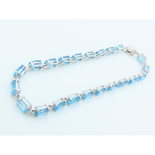 312 - Blue Topaz 9 Carat White Gold Mounted Ladies Line Bracelet Length Approximately 18cm