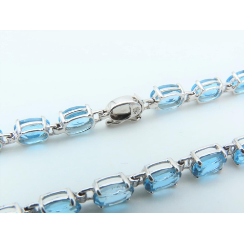 312 - Blue Topaz 9 Carat White Gold Mounted Ladies Line Bracelet Length Approximately 18cm