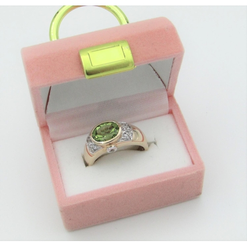 316 - Peridot Ladies Oval Cut Dress Ring Mounted on 9 Carat Gold Ring Size M and a Half Approximately