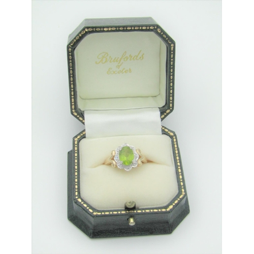 325 - Peridot and Diamond Ladies Cluster Ring Mounted on 9 Carat Gold Band Hallmarked 2006 Ring Size N