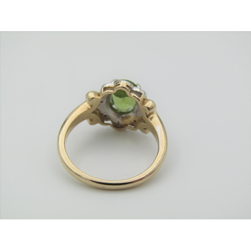 325 - Peridot and Diamond Ladies Cluster Ring Mounted on 9 Carat Gold Band Hallmarked 2006 Ring Size N