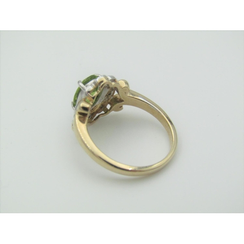 325 - Peridot and Diamond Ladies Cluster Ring Mounted on 9 Carat Gold Band Hallmarked 2006 Ring Size N