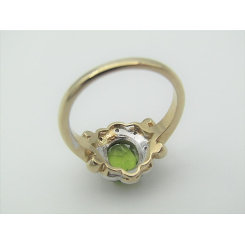 325 - Peridot and Diamond Ladies Cluster Ring Mounted on 9 Carat Gold Band Hallmarked 2006 Ring Size N