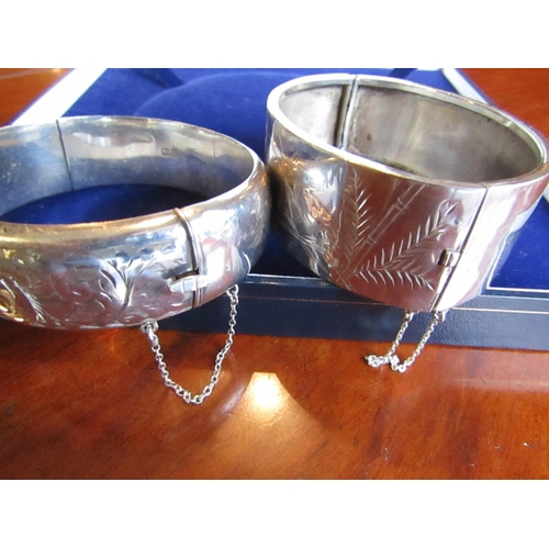 392 - Two Solid Silver Ladies Bangles Hinged Form with Engraved Decoration Safety Chains Present