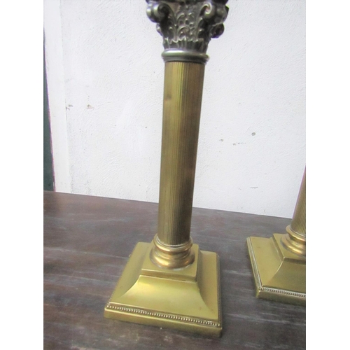 436 - Pair of Antique Cast Brass Corinthian Column Candle Sticks Each Approximately 10 Inches High