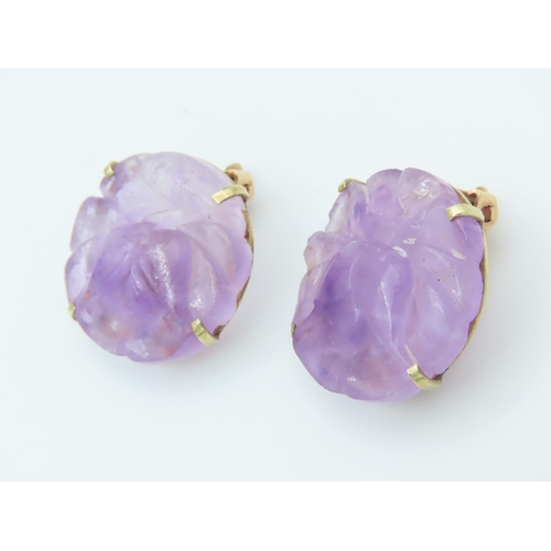 454 - Pair of 14 Carat Yellow Gold Mounted Carved Amethyst Earrings of Attractive Colour