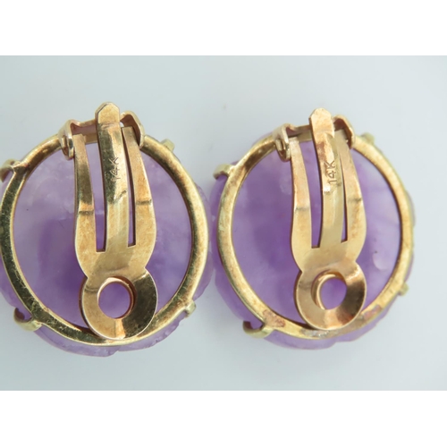 454 - Pair of 14 Carat Yellow Gold Mounted Carved Amethyst Earrings of Attractive Colour