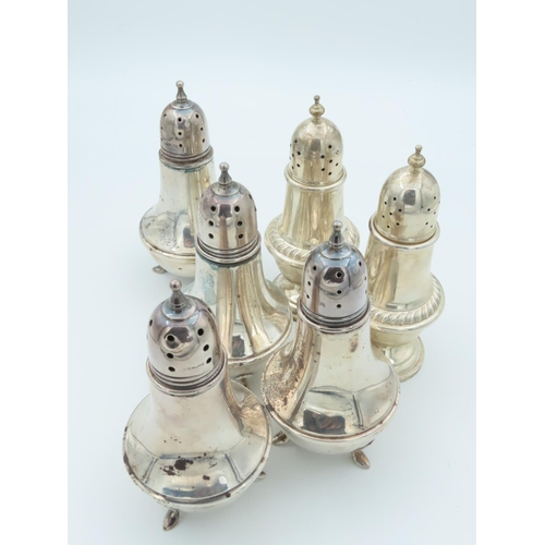 476 - Set of Four Solid Silver Salt and Peppers Shaped Pedestal Form Each on Tripod Supports Please Note: ... 