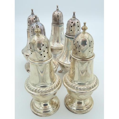 476 - Set of Four Solid Silver Salt and Peppers Shaped Pedestal Form Each on Tripod Supports Please Note: ... 