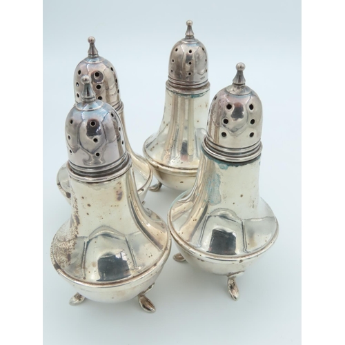 476 - Set of Four Solid Silver Salt and Peppers Shaped Pedestal Form Each on Tripod Supports Please Note: ... 