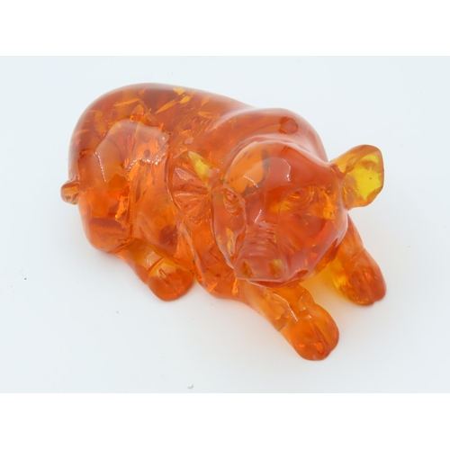 480 - Amber Figure of Seated Pig Approximately 3 Inches Wide