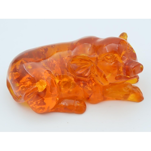 480 - Amber Figure of Seated Pig Approximately 3 Inches Wide