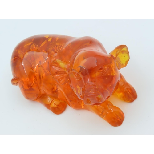 480 - Amber Figure of Seated Pig Approximately 3 Inches Wide