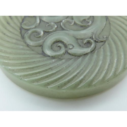 498 - Victorian Circular Form Jade Roundel with Incised Decoration Approximately 3 Inches Diameter