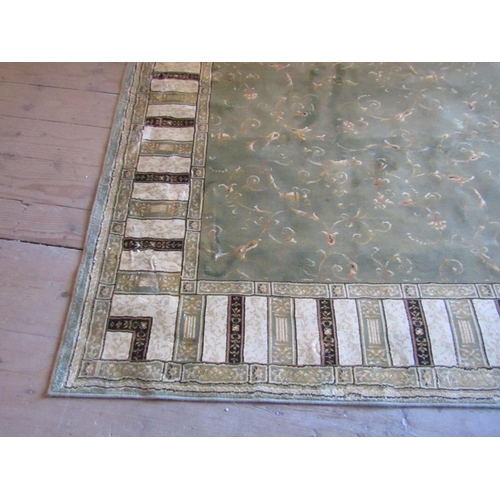 512 - Pale Green Ground Rug with Repeated Border Decoration Approximately 8ft Long x 5ft Wide