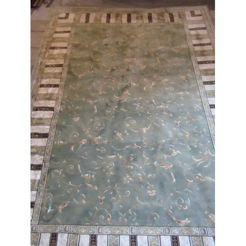 512 - Pale Green Ground Rug with Repeated Border Decoration Approximately 8ft Long x 5ft Wide