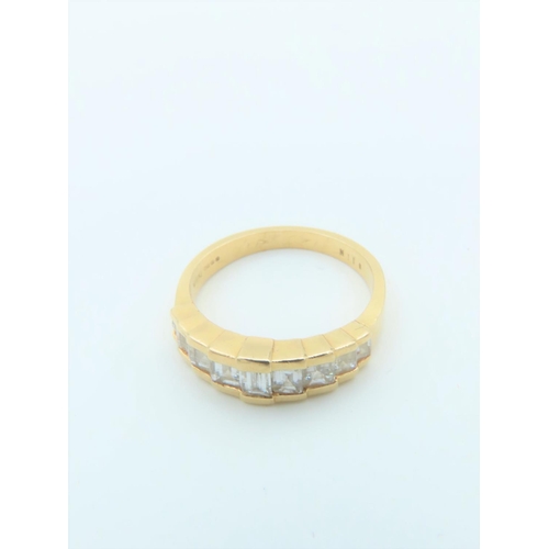 534 - Diamond Ladies Band Ring of Graduated Form on 18 Carat Yellow Gold Size N and a Half