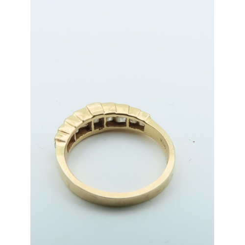 534 - Diamond Ladies Band Ring of Graduated Form on 18 Carat Yellow Gold Size N and a Half