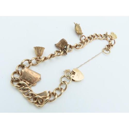 552 - 9 Carat Yellow Gold Charm Bracelet