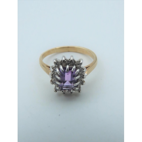 557 - Amethyst and Diamond Cluster Ring Mounted on 9 Carat Gold Band Ring Size N