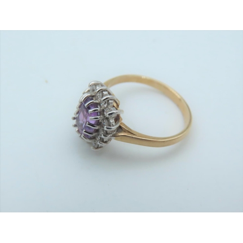 557 - Amethyst and Diamond Cluster Ring Mounted on 9 Carat Gold Band Ring Size N