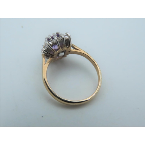 557 - Amethyst and Diamond Cluster Ring Mounted on 9 Carat Gold Band Ring Size N