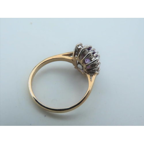 557 - Amethyst and Diamond Cluster Ring Mounted on 9 Carat Gold Band Ring Size N