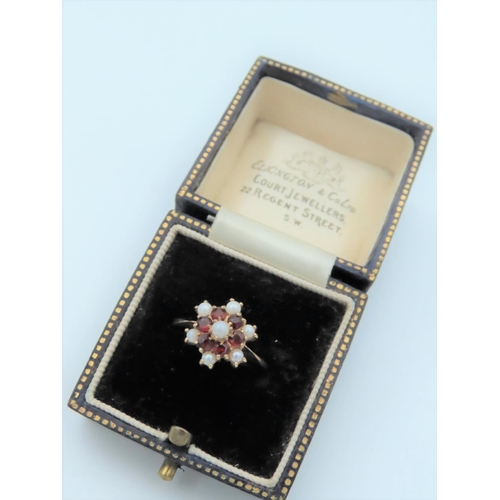 559 - Garnet and Pearl Set Ladies Ring Mounted on 9 Carat Gold Hallmarked London 1988 Ring Size L