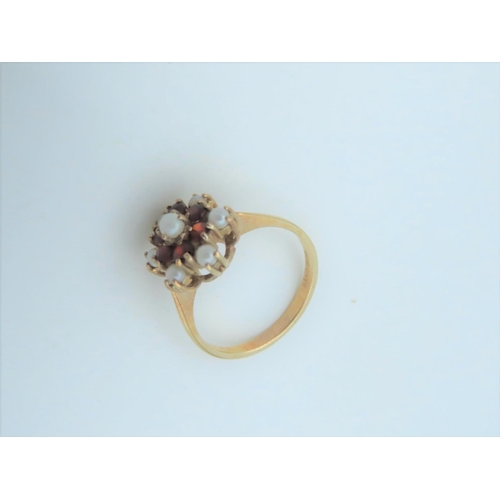 559 - Garnet and Pearl Set Ladies Ring Mounted on 9 Carat Gold Hallmarked London 1988 Ring Size L