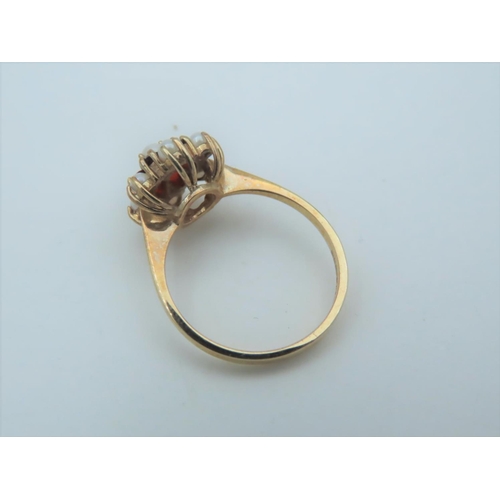 559 - Garnet and Pearl Set Ladies Ring Mounted on 9 Carat Gold Hallmarked London 1988 Ring Size L