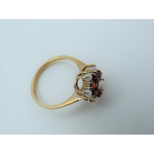 559 - Garnet and Pearl Set Ladies Ring Mounted on 9 Carat Gold Hallmarked London 1988 Ring Size L