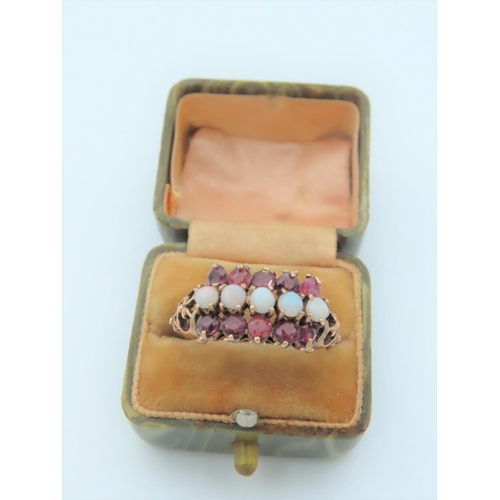 560 - Three Stone Gemset Ladies Ring Mounted on 9 Carat Gold Hallmarked 1981 Ring Size Q Garnet and Opal S... 