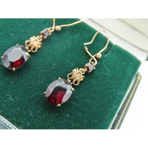 575 - Pair of Garnet Pendant Earrings Mounted on 9 Carat Gold Each Stone Approximately 21 mm High