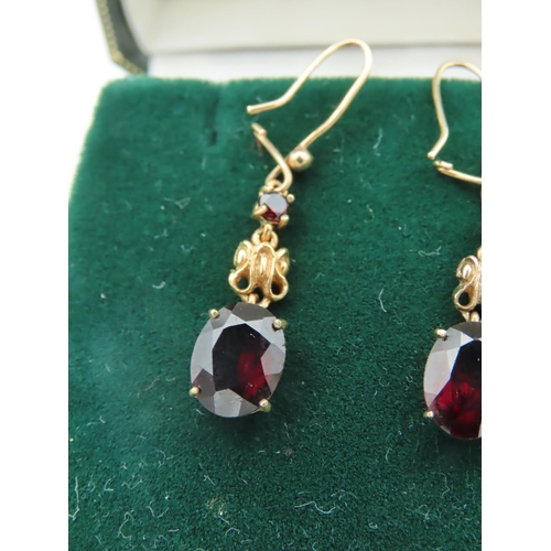 575 - Pair of Garnet Pendant Earrings Mounted on 9 Carat Gold Each Stone Approximately 21 mm High