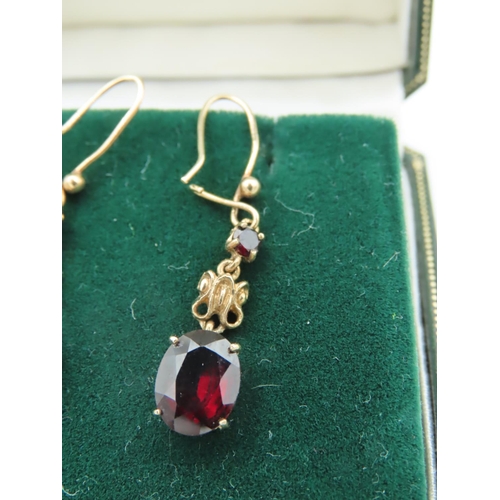 575 - Pair of Garnet Pendant Earrings Mounted on 9 Carat Gold Each Stone Approximately 21 mm High