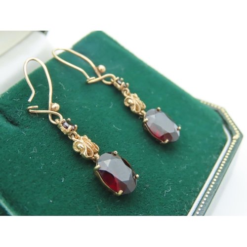 575 - Pair of Garnet Pendant Earrings Mounted on 9 Carat Gold Each Stone Approximately 21 mm High