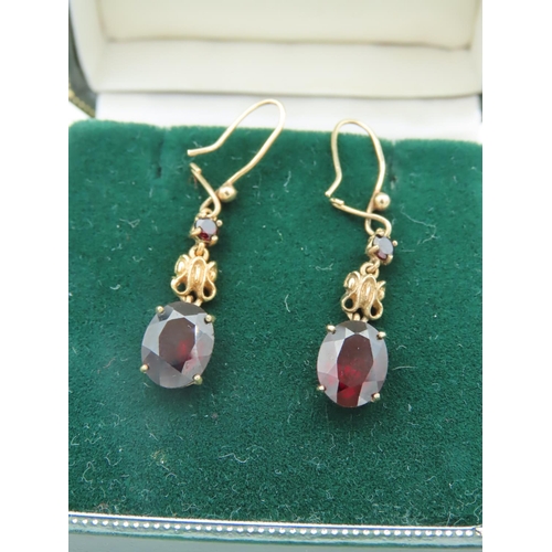 575 - Pair of Garnet Pendant Earrings Mounted on 9 Carat Gold Each Stone Approximately 21 mm High