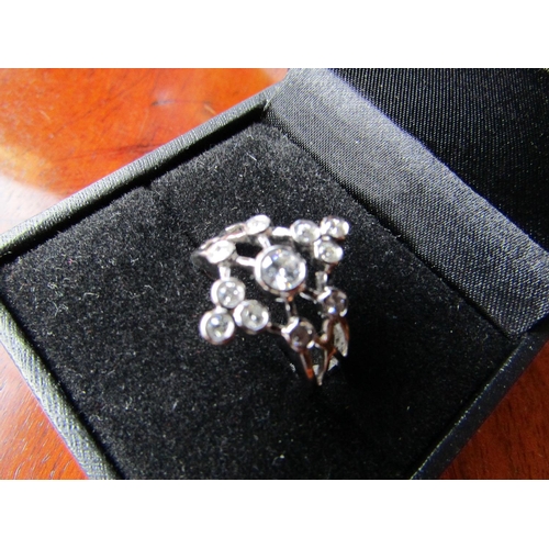 628 - Star Flower Motif 18 Carat White Gold Diamond Ring of Attractive Colour Ring Size N and a Half