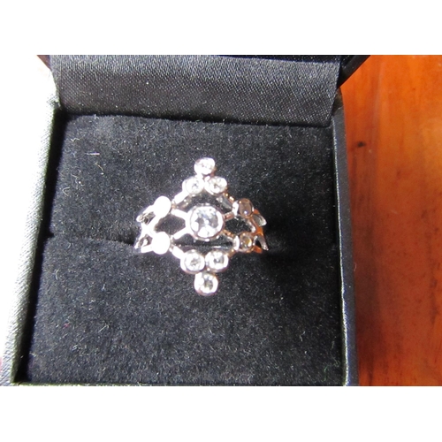 628 - Star Flower Motif 18 Carat White Gold Diamond Ring of Attractive Colour Ring Size N and a Half