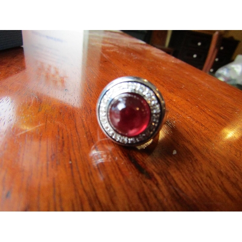 629 - Rubellite Cabochon Cut Centre Stone Ring Diamond Surround Mounted on 18 Carat White Gold Ring Size O