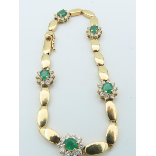 654 - 18 Carat Yellow Gold Diamond and Emerald Decorated Ladies Bracelet Articulated Form