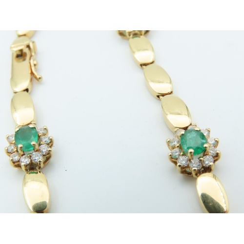 654 - 18 Carat Yellow Gold Diamond and Emerald Decorated Ladies Bracelet Articulated Form